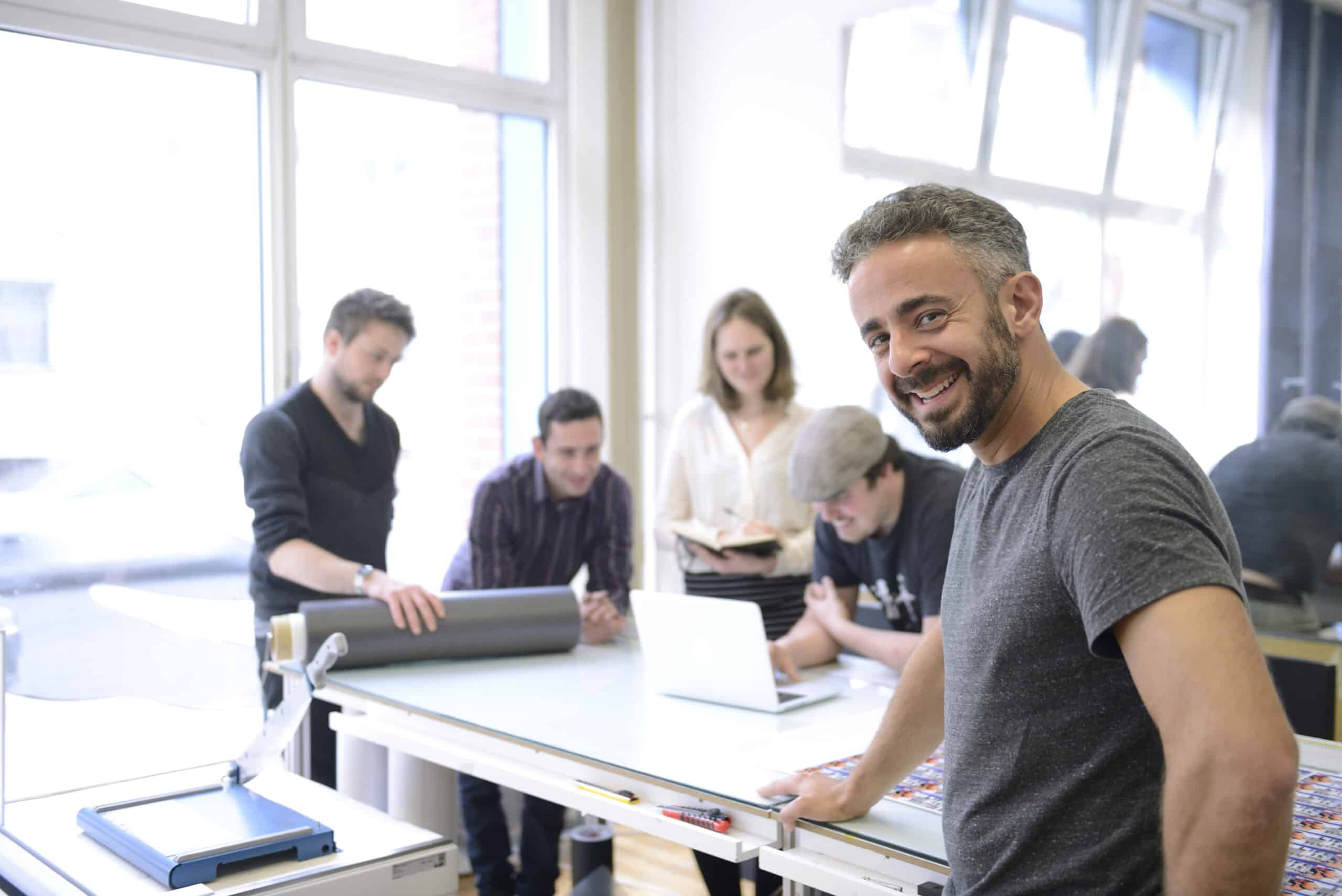 Advertising agency owner and his team